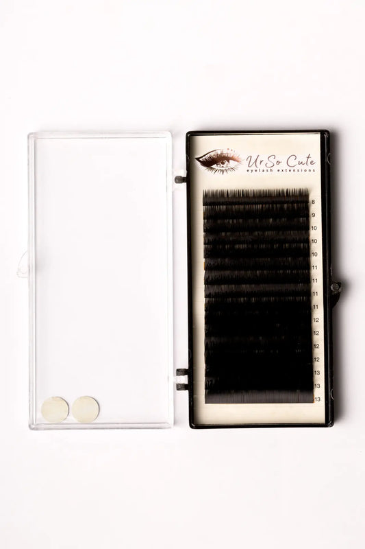 Black false eyelash strip set in clear case for volume lashes with hypoallergenic adhesive glue solution for lash techs in malta